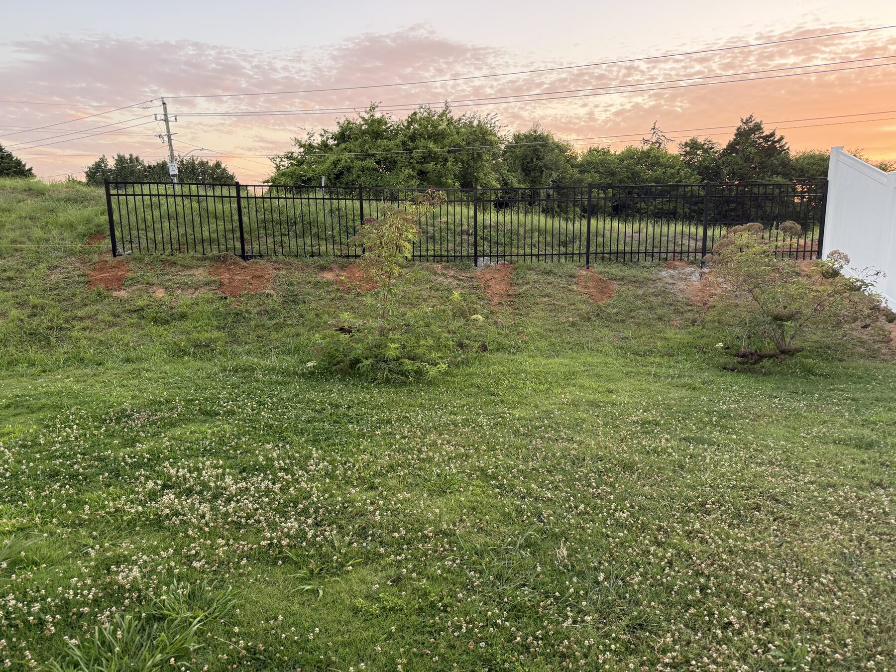 Completed aluminum and vinyl fence combination