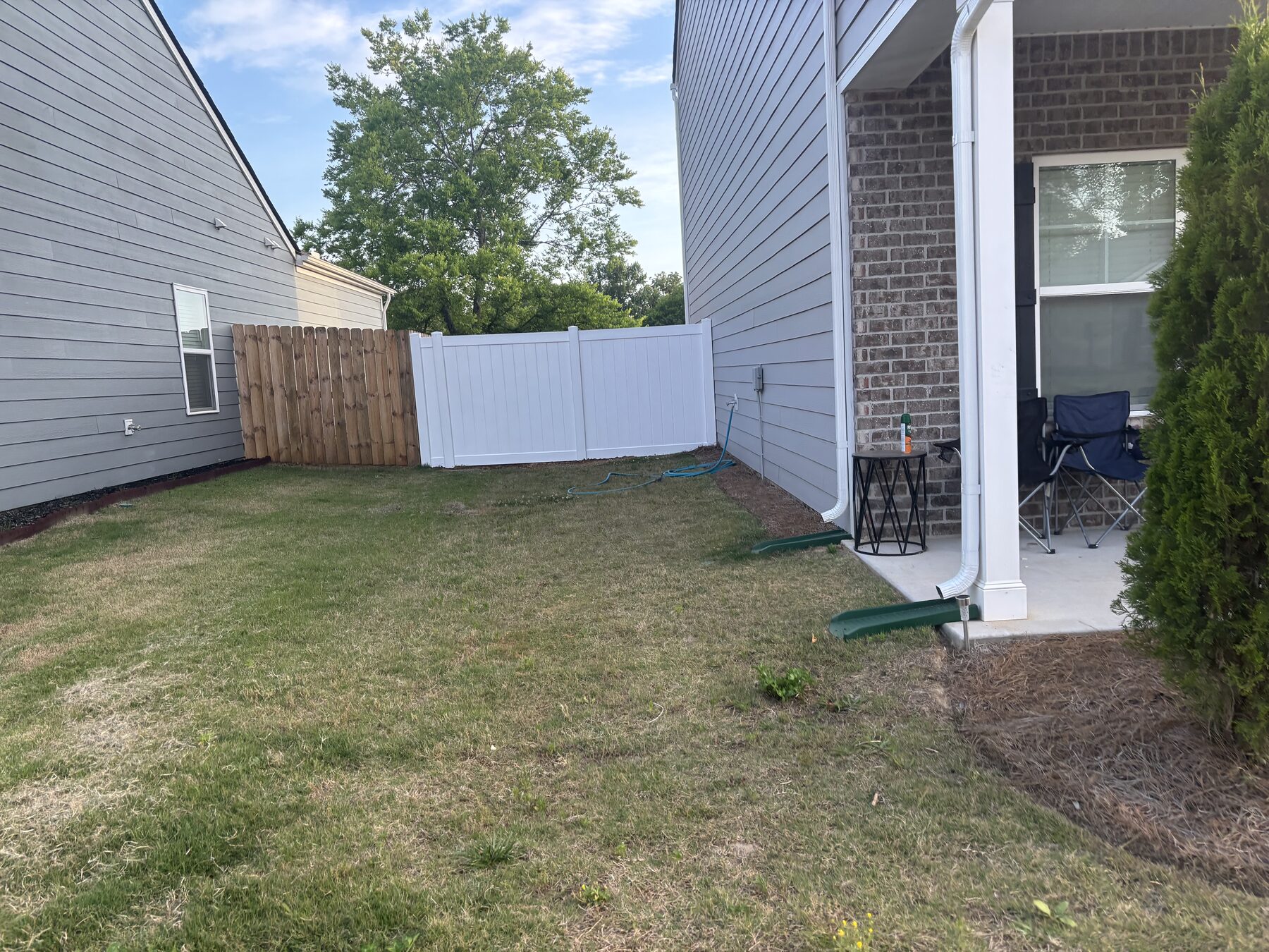 Completed white vinyl double gate